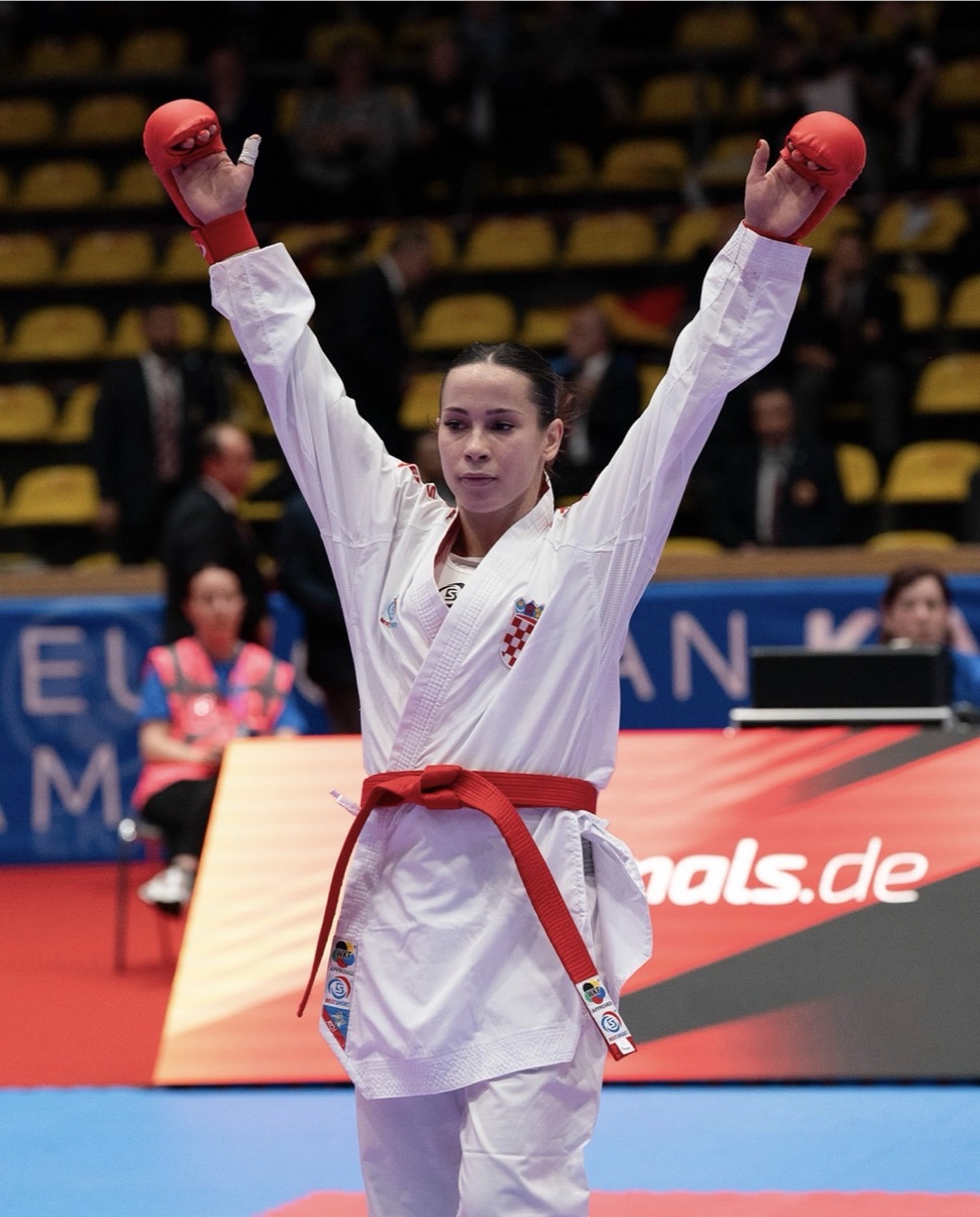 Ema Sgardelli of Croatia raises her arms after a winning bout at the 2026 EKF Senior Championships in Frankfurt