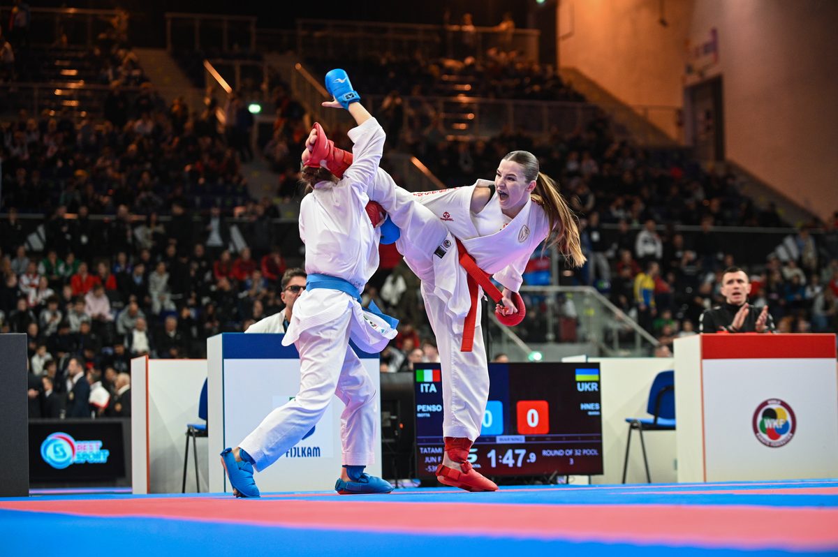 Mariia Hnes lands a kick against Italy