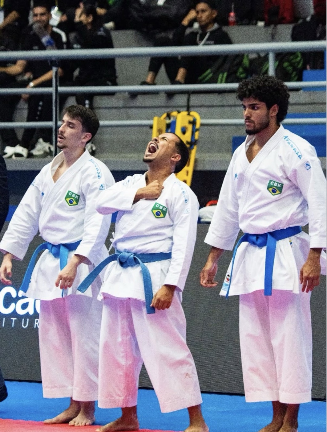Júlio Garcia celebrating with Brazil's U21 team kata squad at PKF Macaé 2026